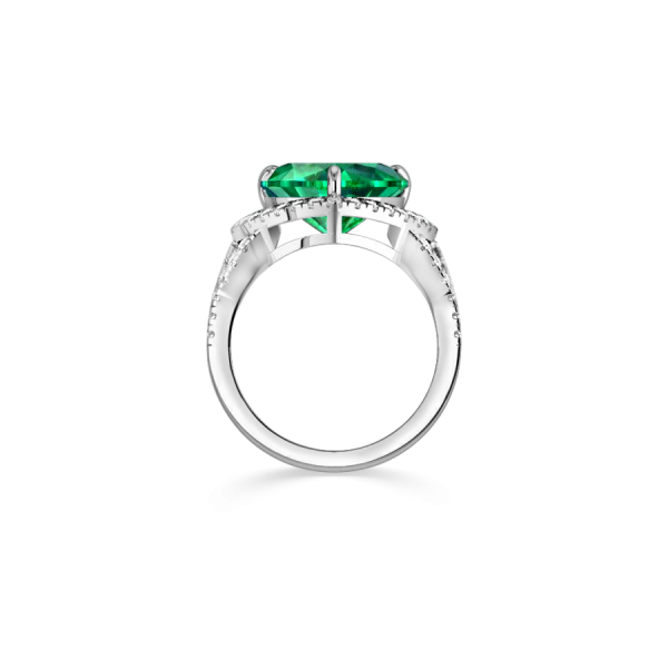 white gold emerald engagement ring with diamonds